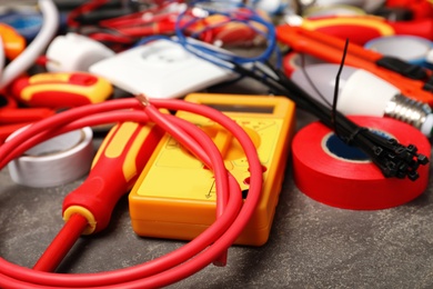 Photo of Set of electrician's tools on gray table