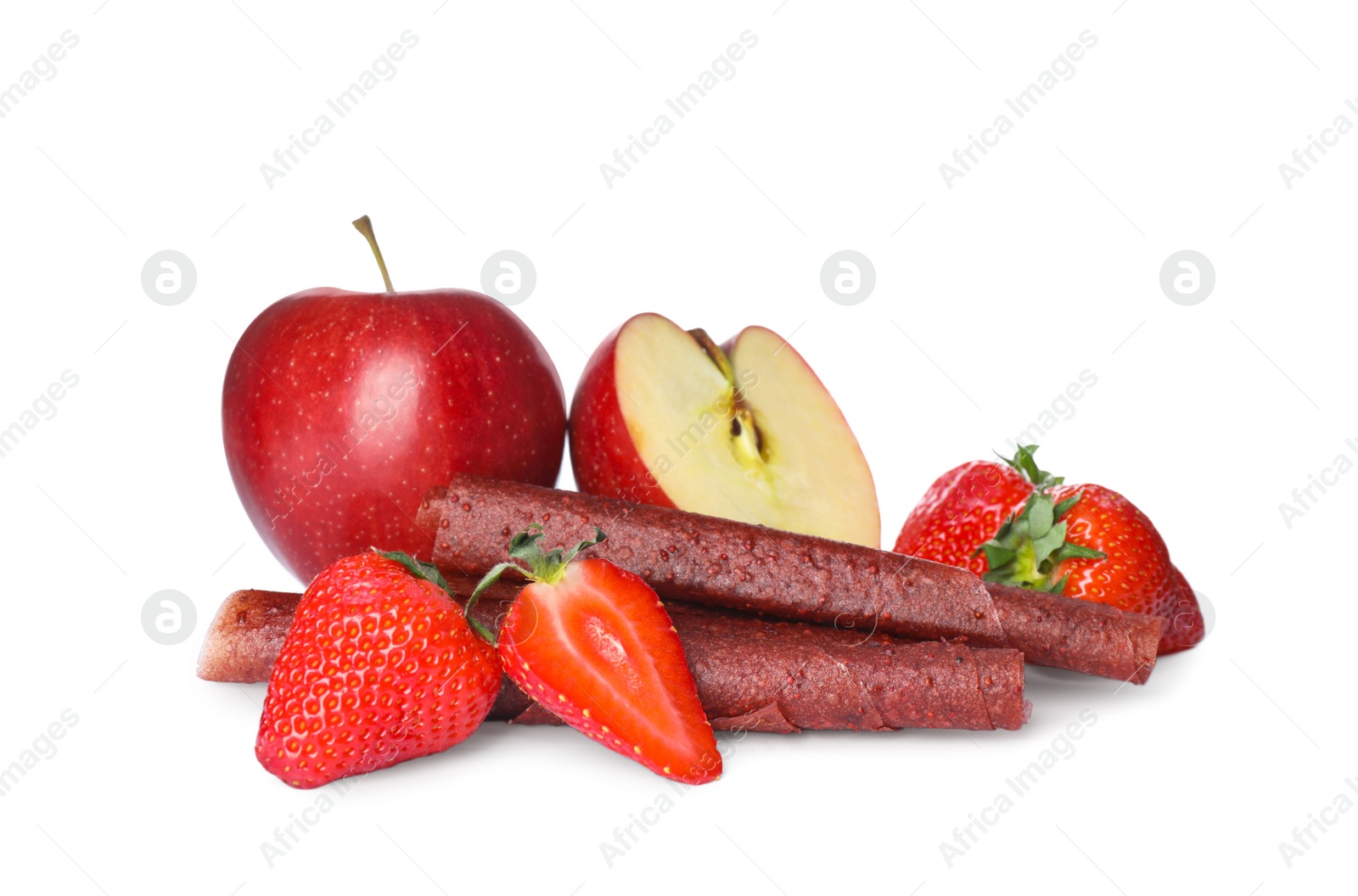 Photo of Delicious fruit leather rolls, apples and strawberries  on white background