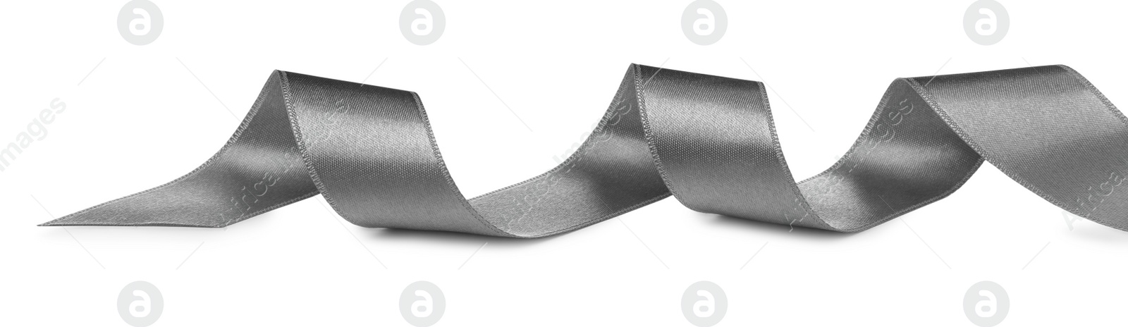 Photo of Beautiful silver ribbon isolated on white. Festive decor