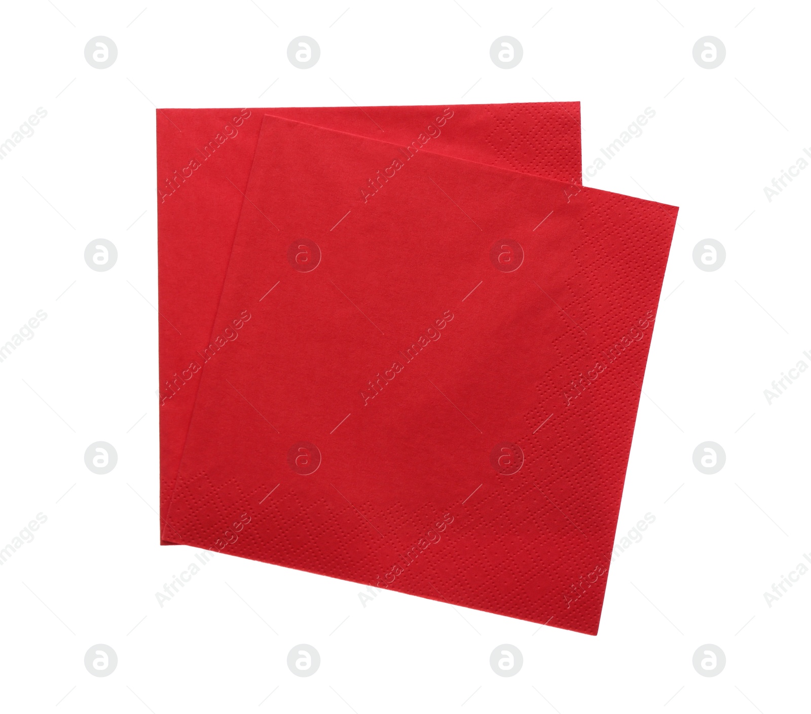 Photo of Red clean paper tissues on white background, top view