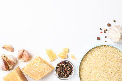 Photo of Different ingredients on white background, top view. Risotto recipe