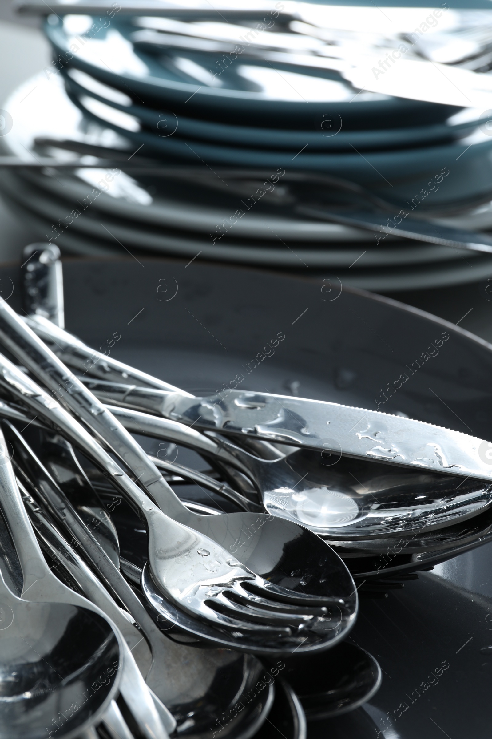 Photo of Different clean kitchenware on table, closeup view