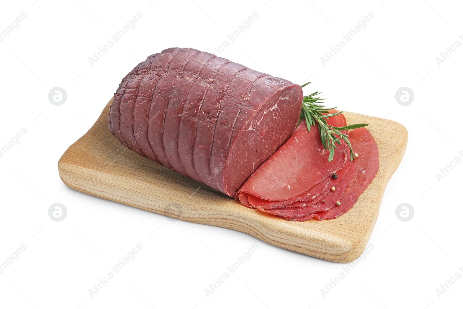 Photo of Tasty fresh dry bresaola, peppercorns and rosemary isolated on white