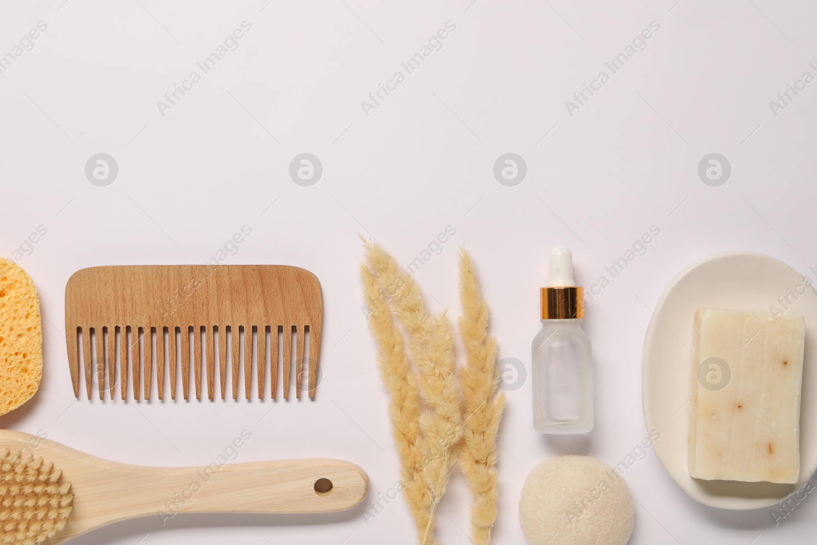 Photo of Bath accessories. Different personal care products and dry spikelets on white background, flat lay with space for text