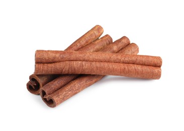 Photo of Three aromatic cinnamon sticks isolated on white