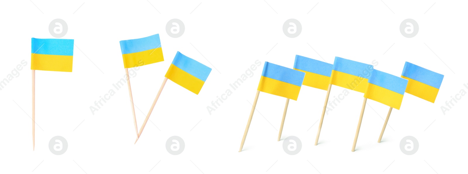Image of Set of toothpicks with Ukrainian flags on white background. Banner design