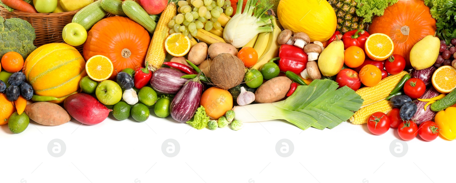 Photo of Assortment of fresh organic fruits and vegetables on white background, top view. Banner design