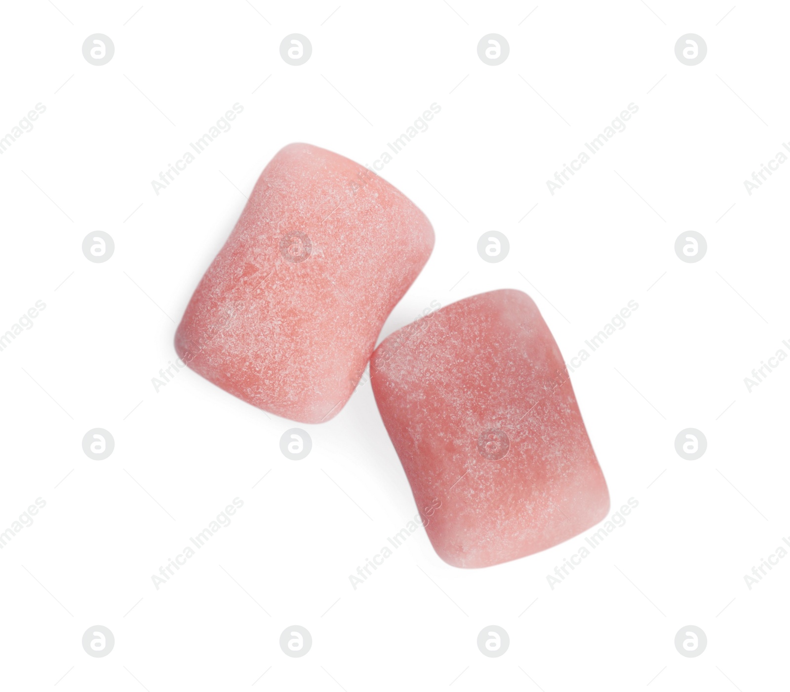 Photo of Tasty sweet chewing gums on white background, top view