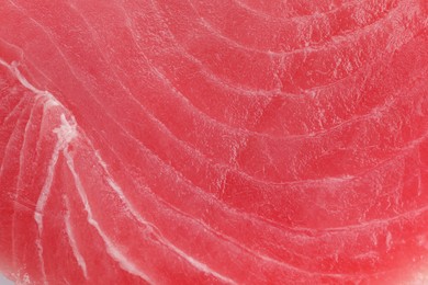 Photo of Fresh raw tuna fillet as background, top view