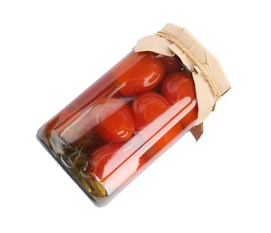 Pickled tomatoes in glass jar on white background, top view