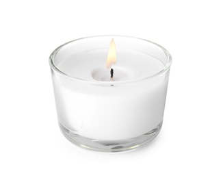 Wax candle in glass holder on white background