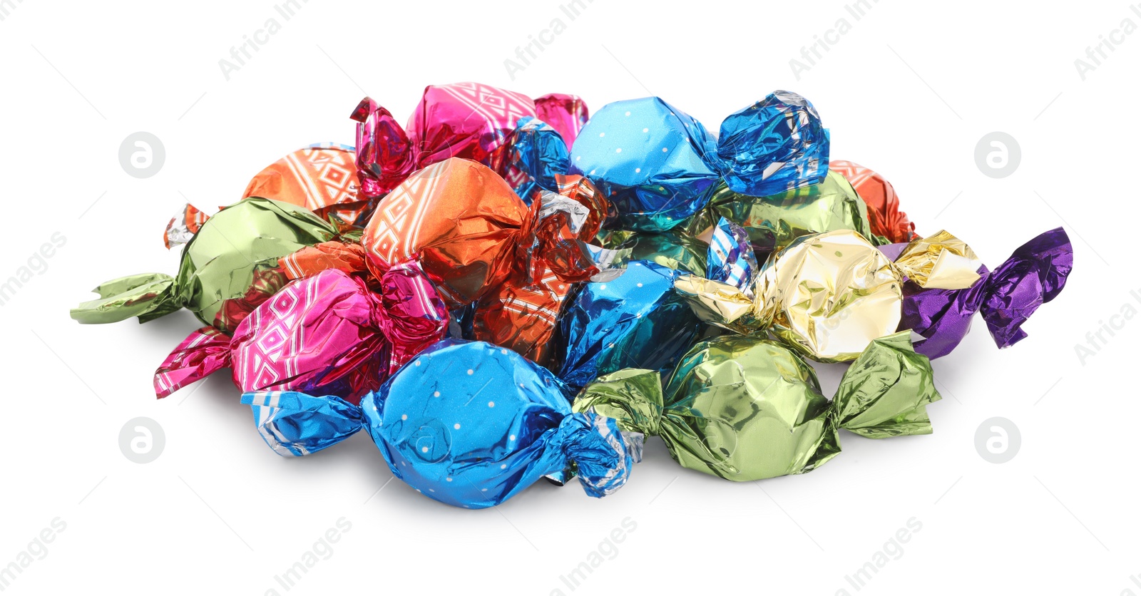 Photo of Pile of sweet candies in colorful wrappers on white background