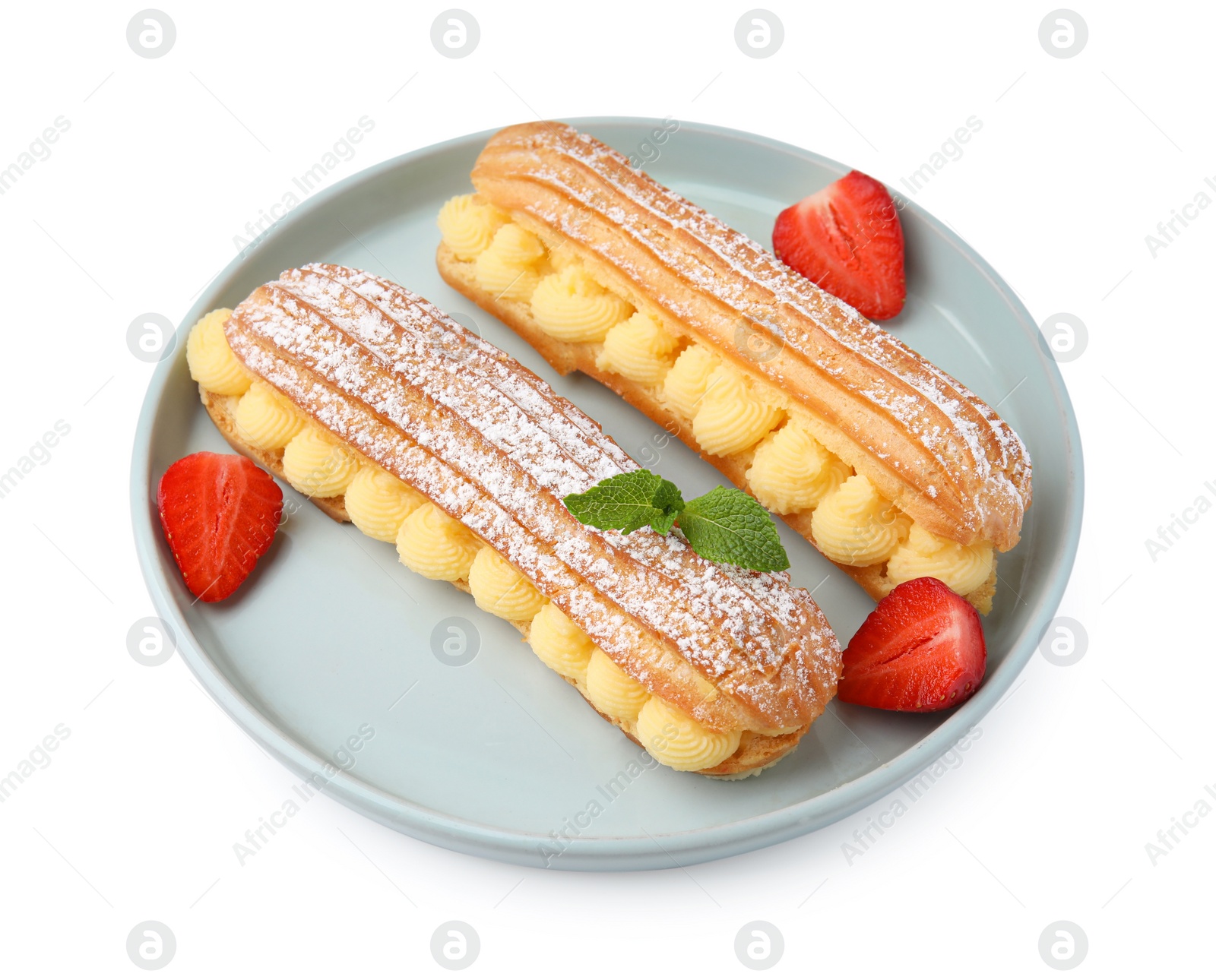 Photo of Delicious eclairs filled with cream, strawberries and mint isolated on white