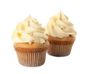 Delicious birthday cupcakes decorated with cream on white background