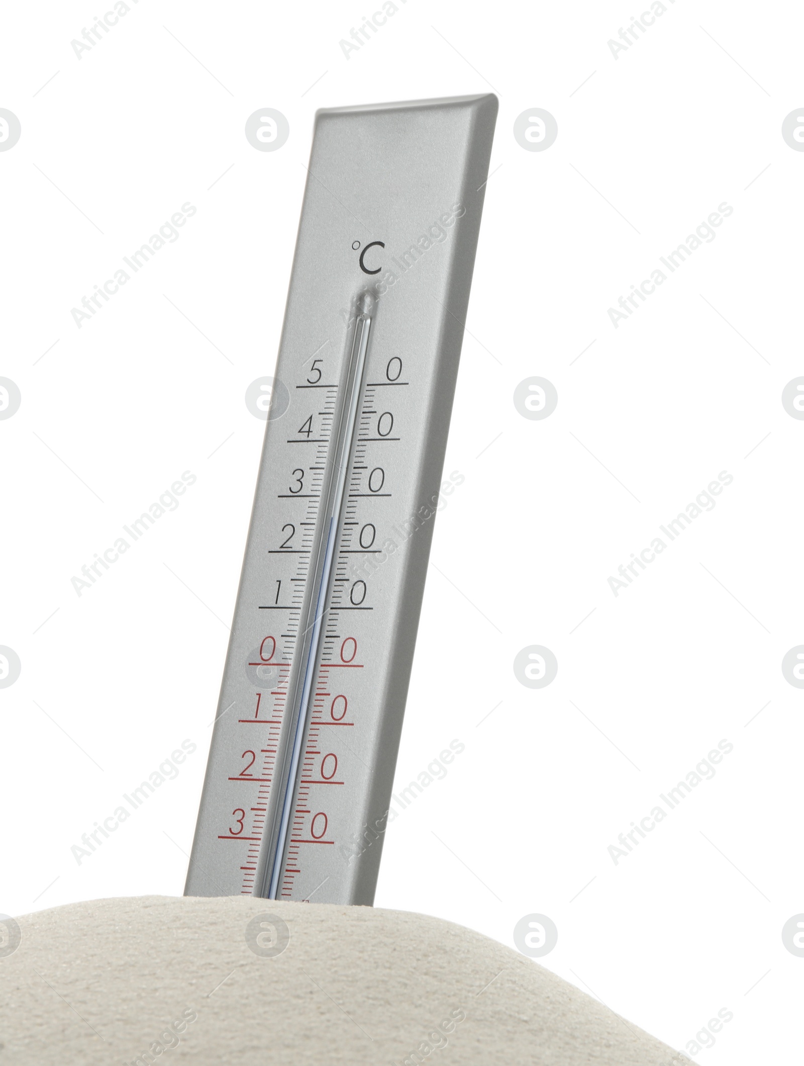 Photo of Weather thermometer in sand against white background