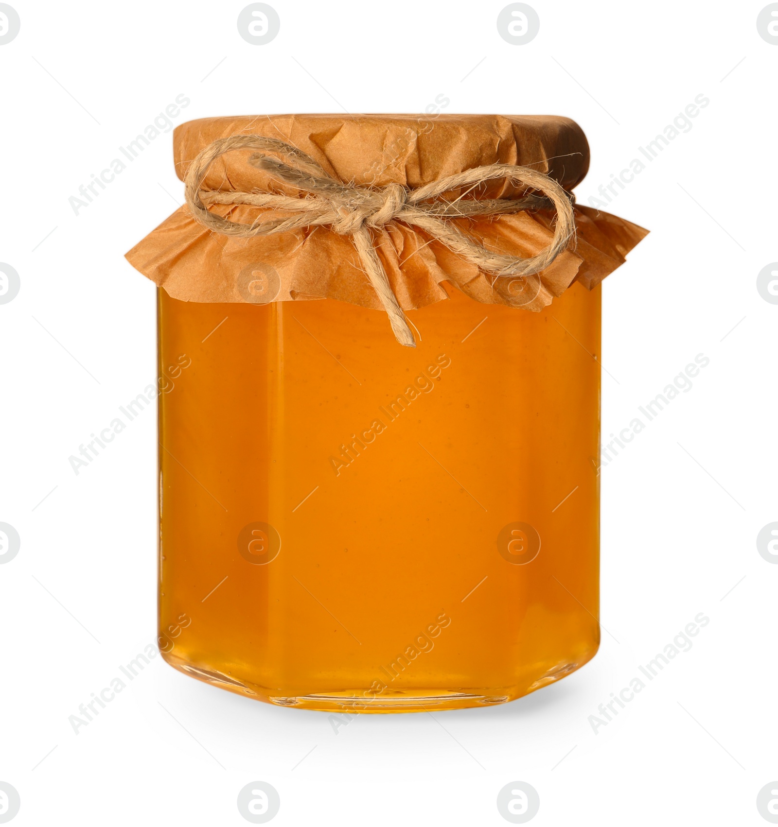 Photo of Tasty honey in glass jar isolated on white