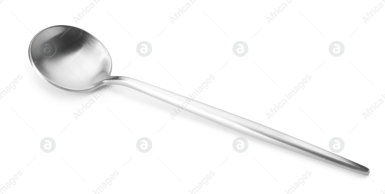 Photo of One shiny silver spoon isolated on white