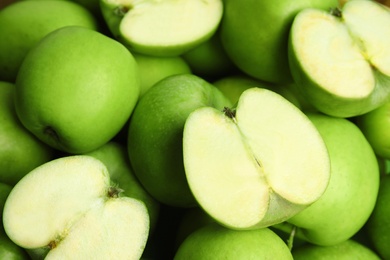 Photo of Fresh ripe green apples as background, closeup view