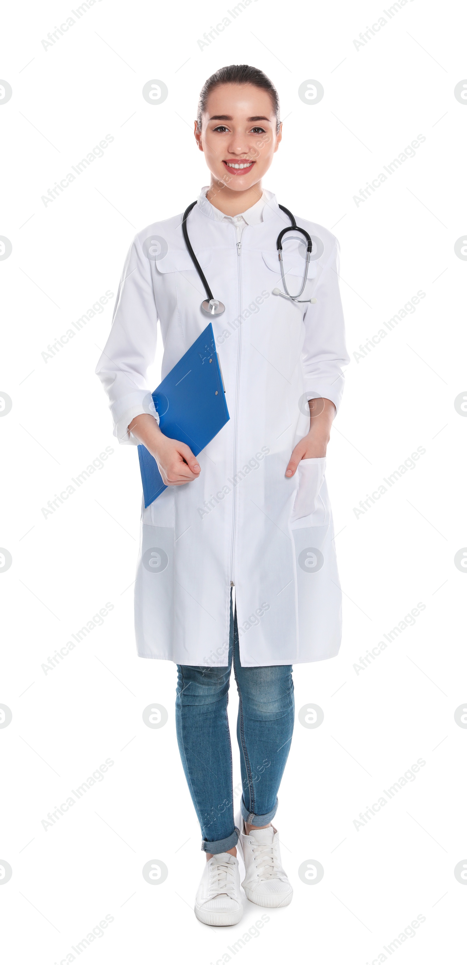 Photo of Full length portrait of medical doctor with clipboard and stethoscope isolated on white