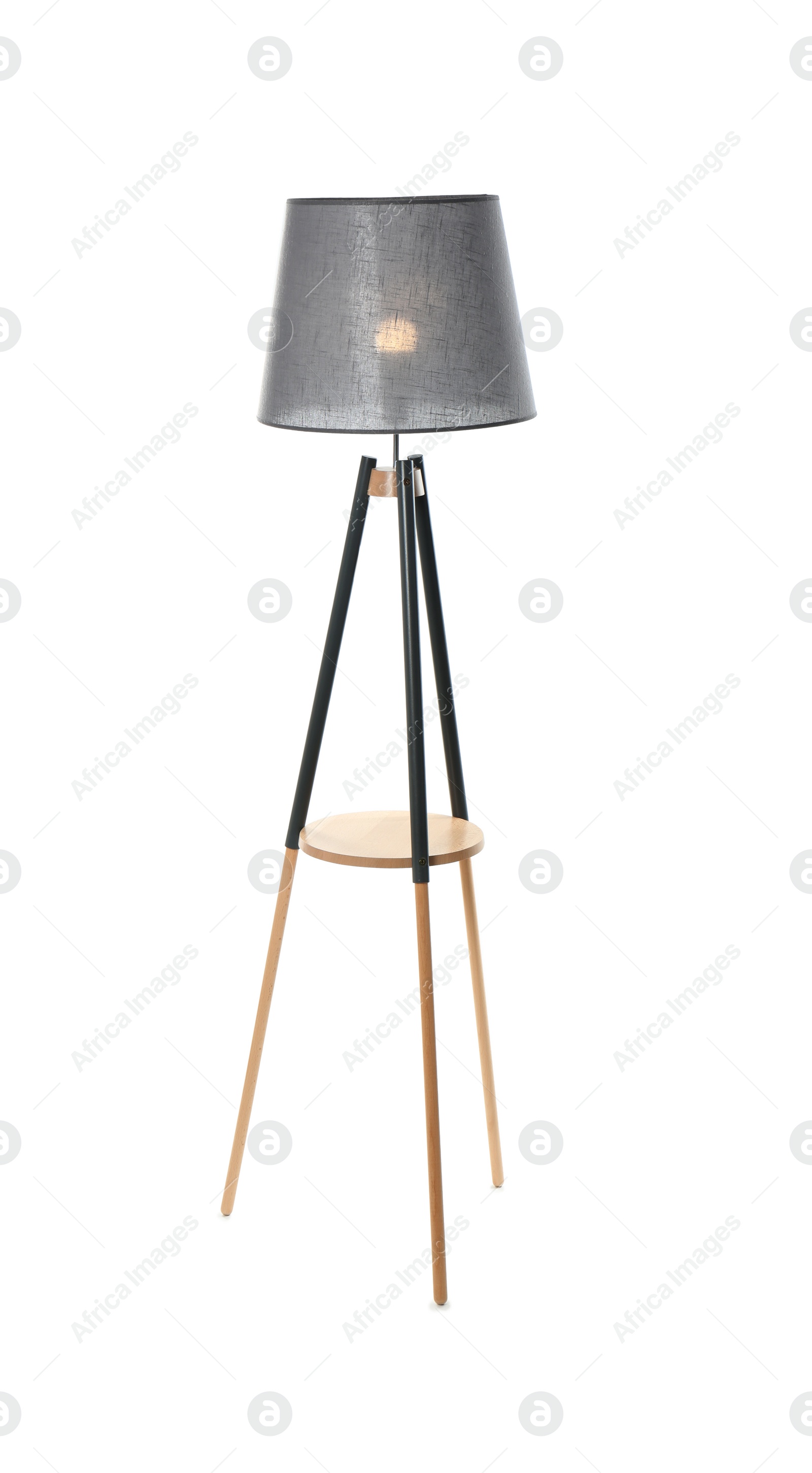 Photo of Stylish floor lamp on white background. Idea for interior design