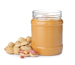 Photo of Jar with creamy peanut butter on white background