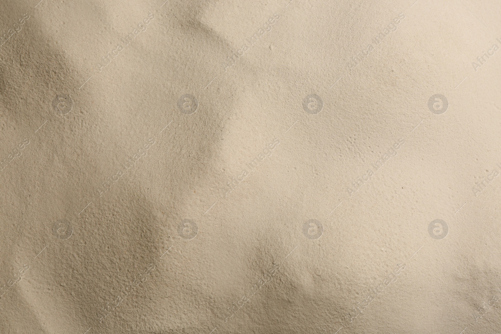 Photo of Dry beach sand as background, top view