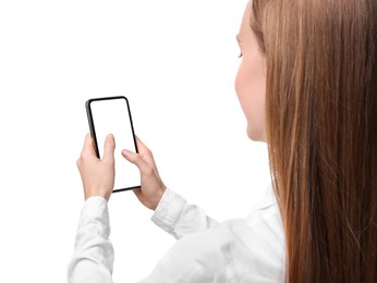 Photo of Woman typing message on smartphone against white background, closeup