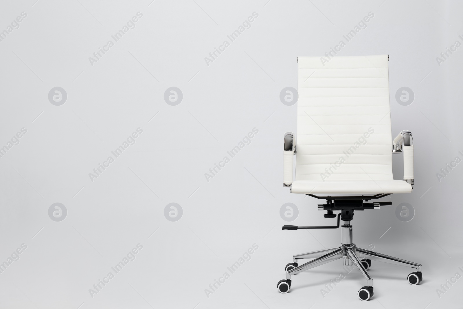 Photo of Comfortable office chair on white background, space for text