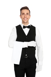 Photo of Portrait of handsome waiter in elegant uniform on white background