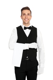 Portrait of handsome waiter in elegant uniform on white background