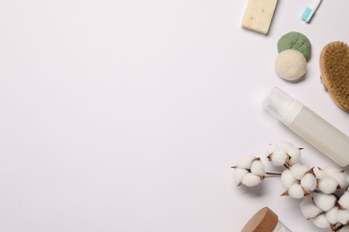 Bath accessories. Flat lay composition with personal care products on white background, space for text