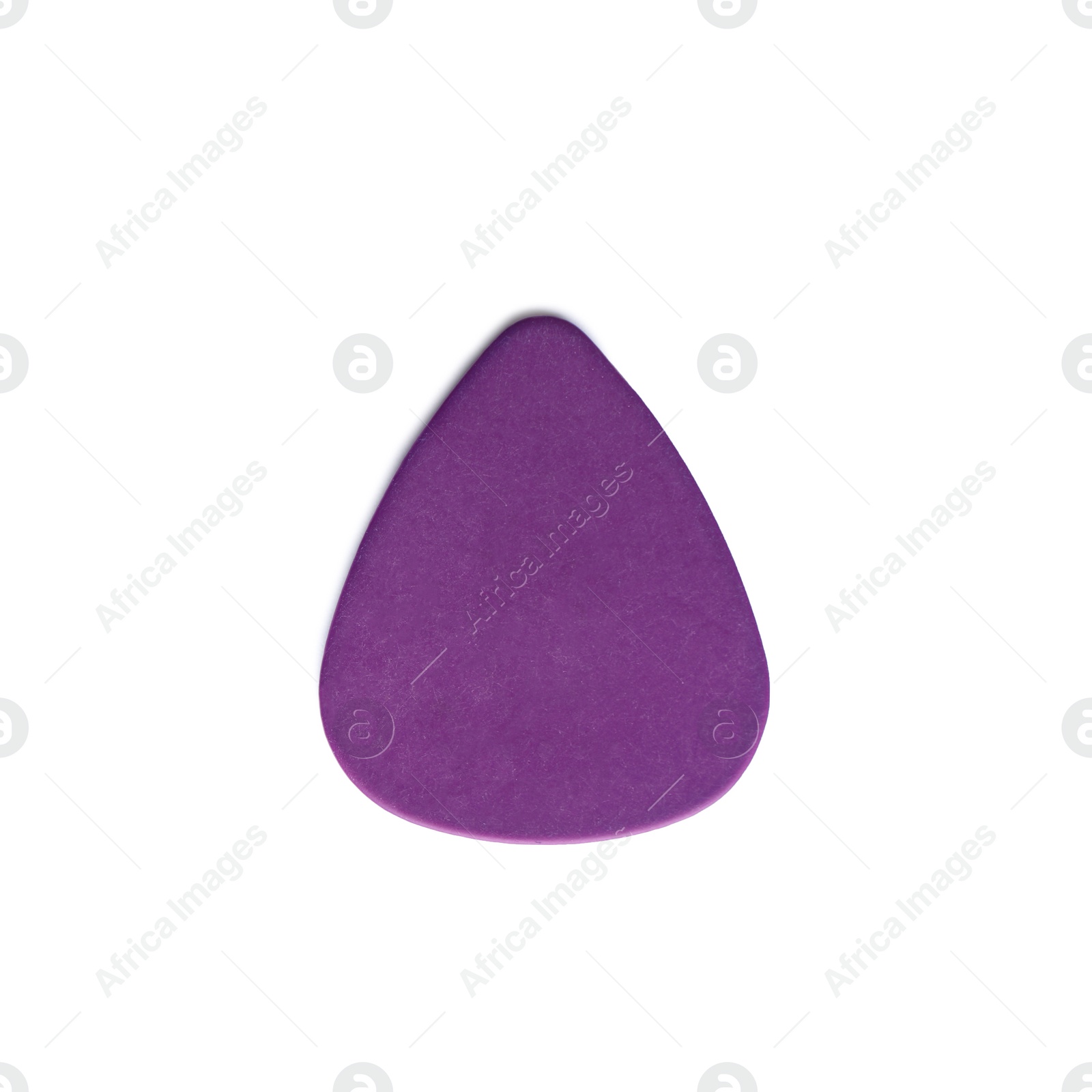 Photo of Guitar pick on white background, top view