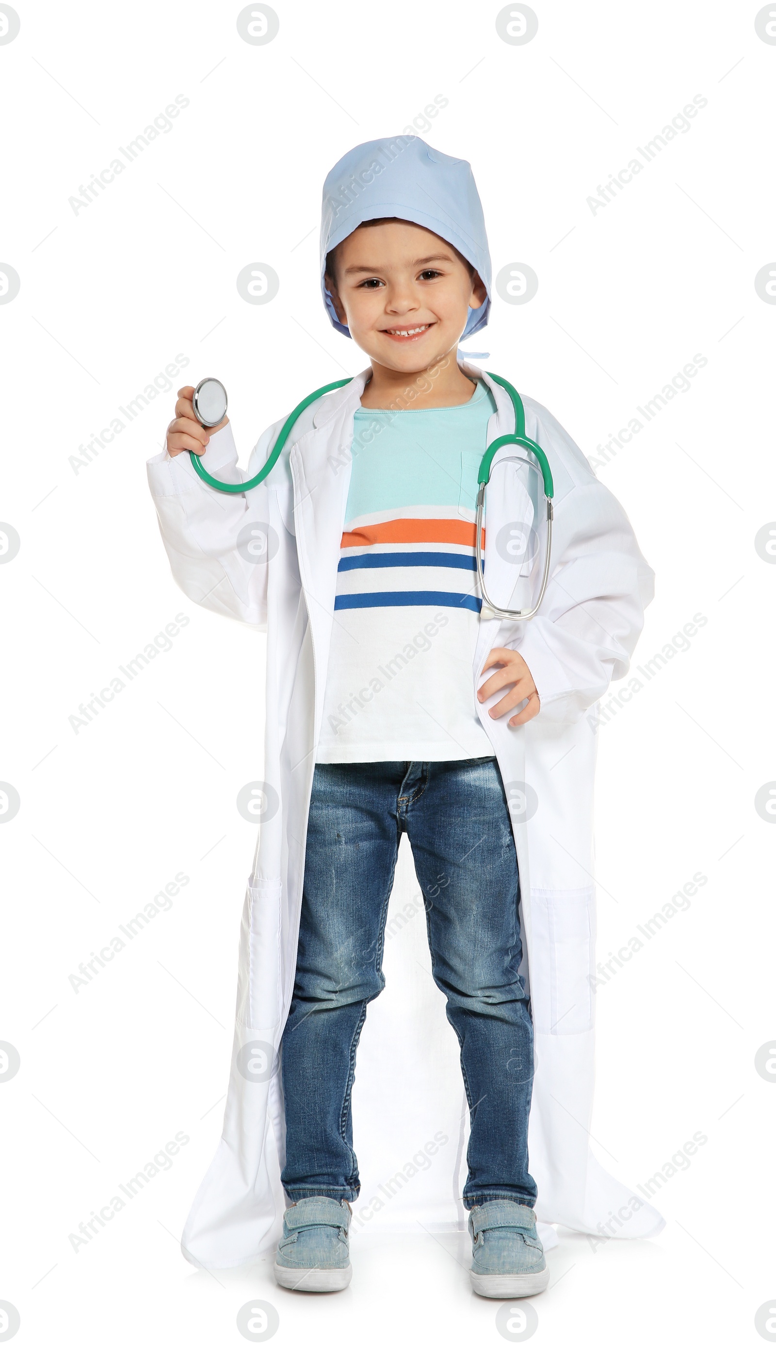 Photo of Cute little child in doctor coat with stethoscope on white background