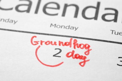 Photo of Calendar with date reminder about Groundhog day, closeup
