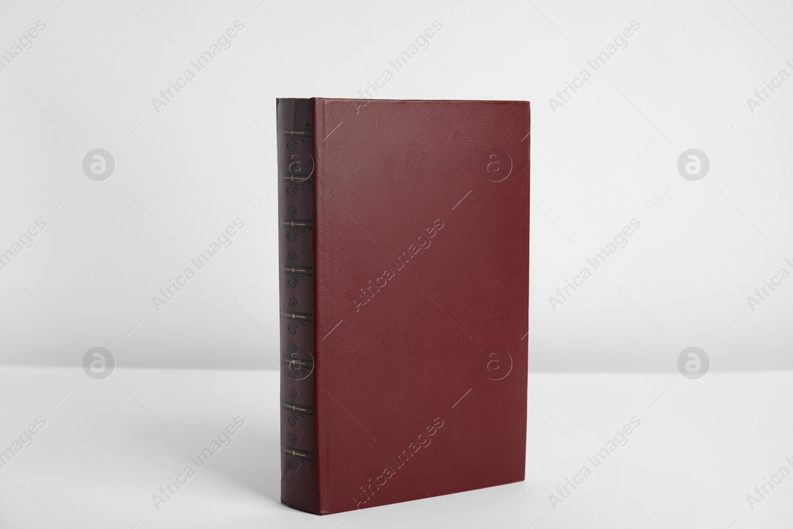 Photo of Blank book with hardcover on white background