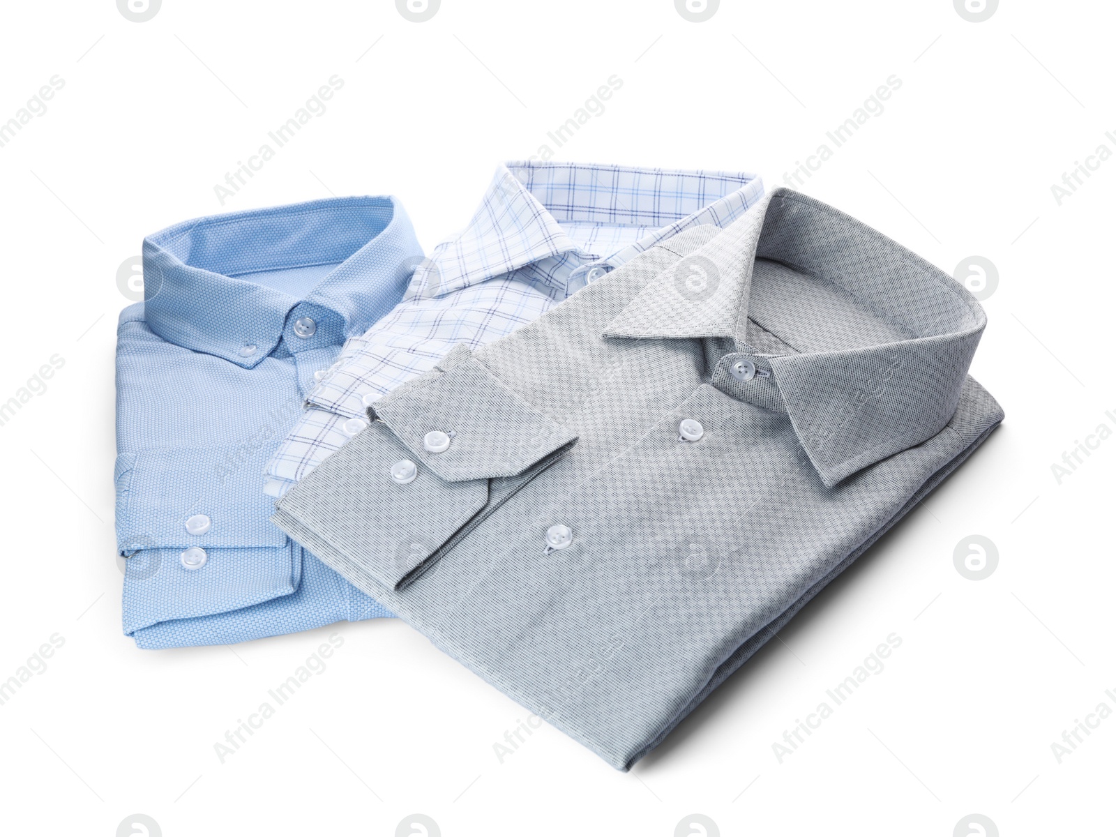 Photo of Different stylish male shirts isolated on white