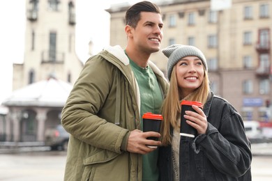 Photo of Beautiful happy couple outdoors on winter day