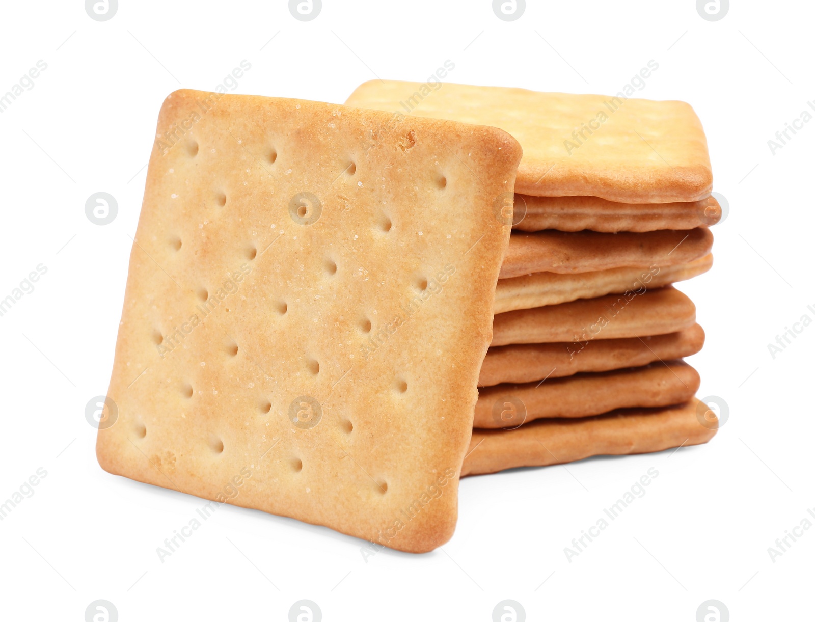 Photo of Tasty crispy square crackers isolated on white