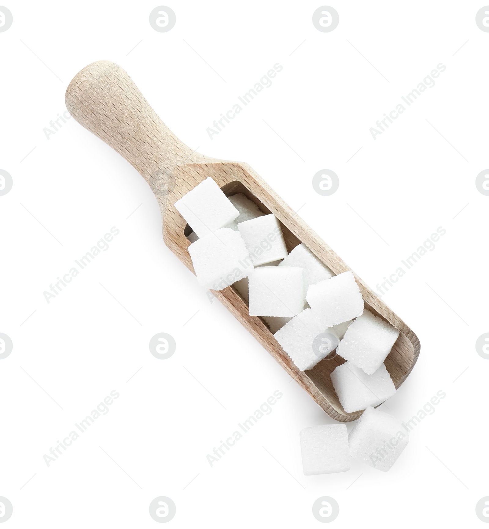 Photo of Sugar cubes in wooden scoop isolated on white, top view