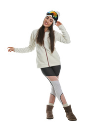 Woman wearing stylish winter sport clothes on white background