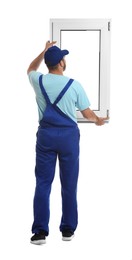 Worker with plastic window on white background. Installation service