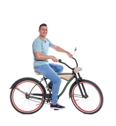 Portrait of handsome man with bicycle on white background