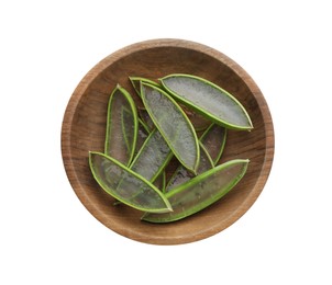 Photo of Bowl with fresh aloe vera slices isolated on white, top view