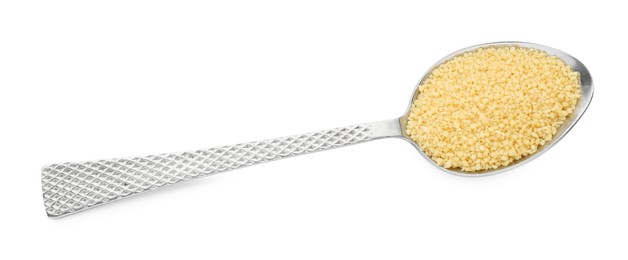 Spoon with raw couscous on white background, top view