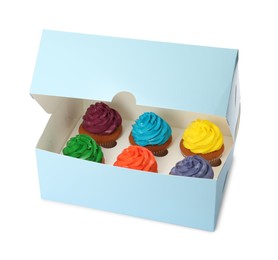 Box with different cupcakes on white background