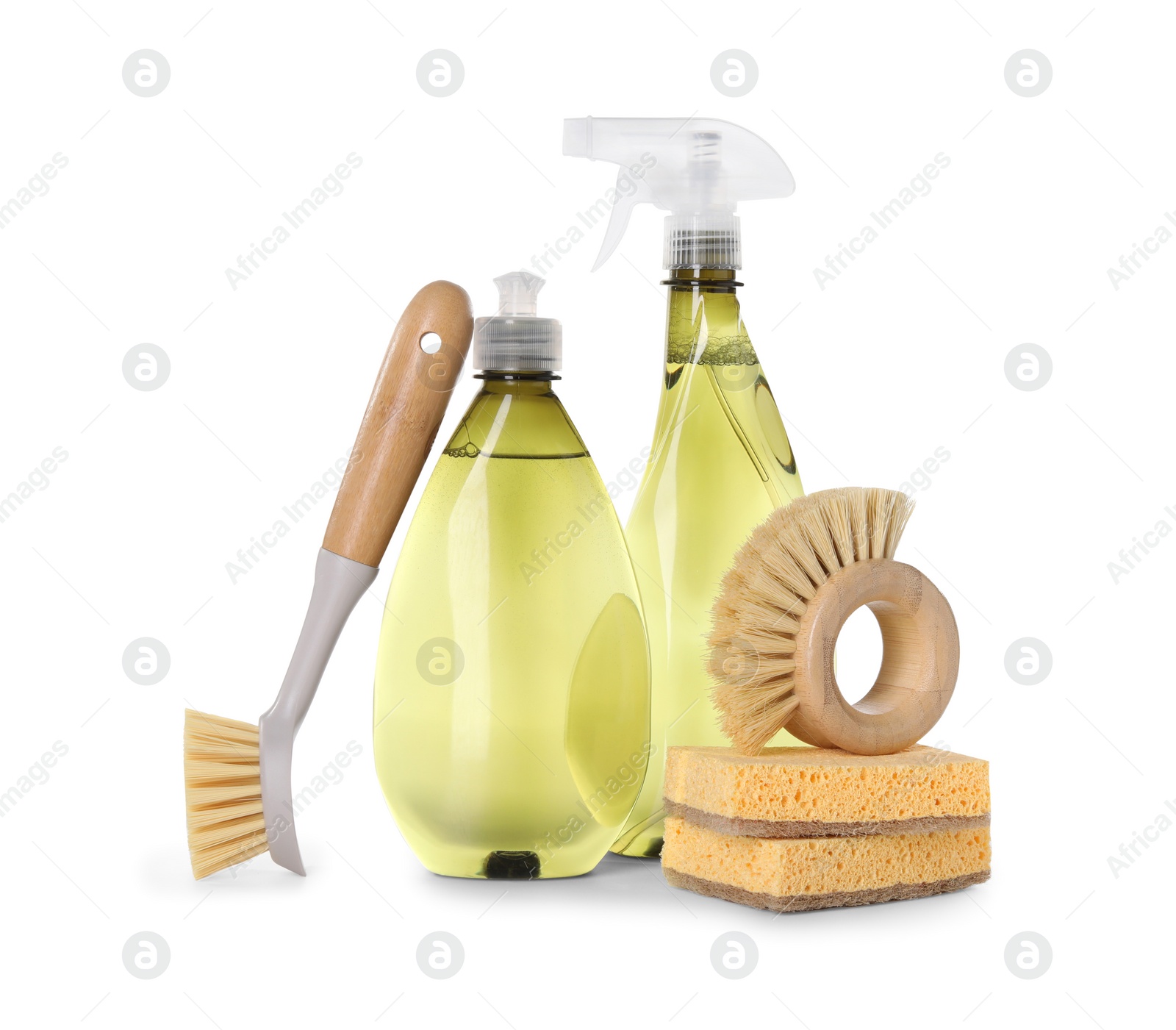 Photo of Bottles of cleaning product, brushes and sponges isolated on white