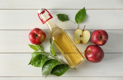 Photo of Flat lay composition with delicious apple cider on white wooden table