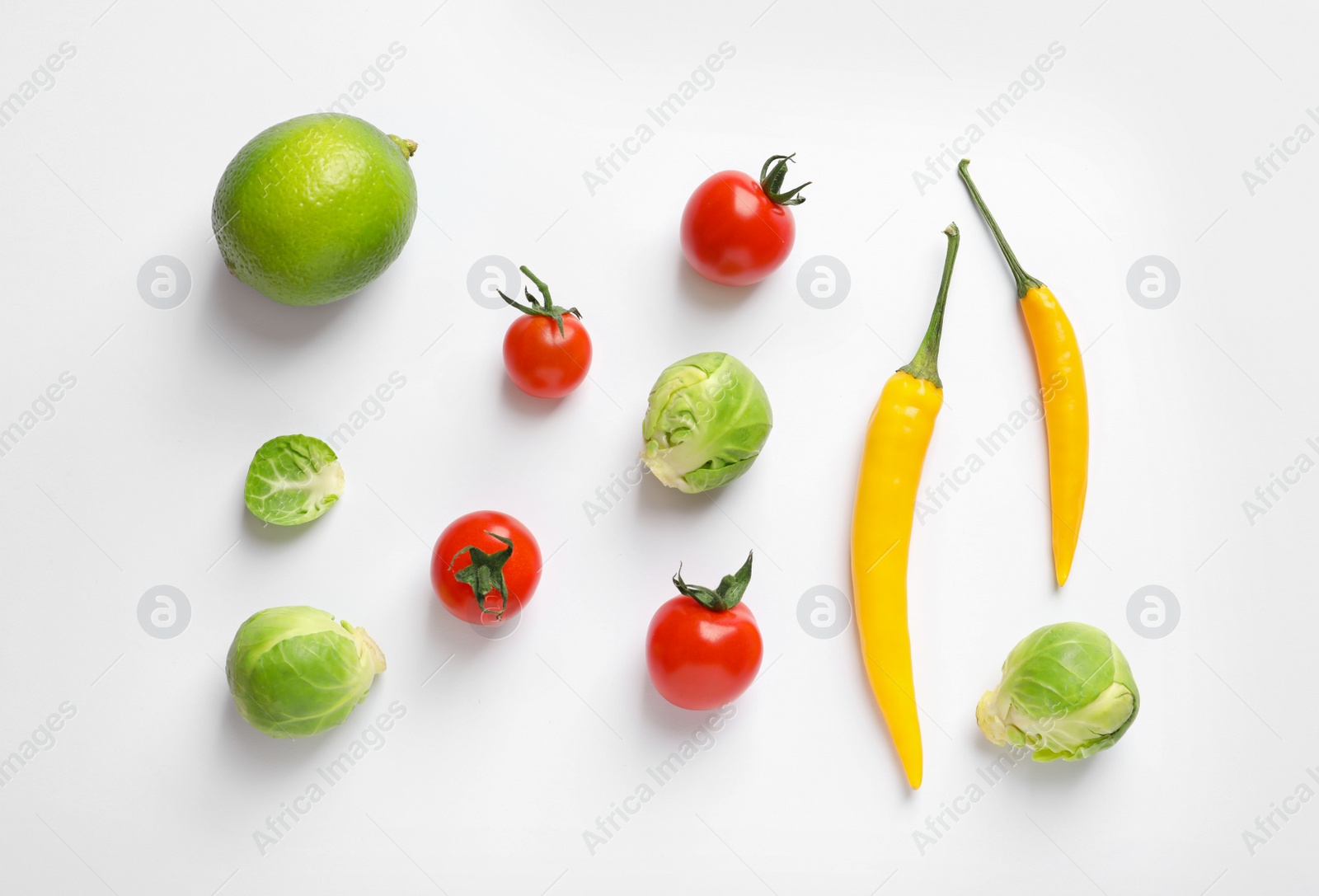 Photo of Fresh vegetables and fruit on white background, top view