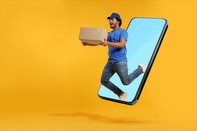 Image of Courier with parcel jumping out from huge smartphone on golden background. Delivery service. Space for text