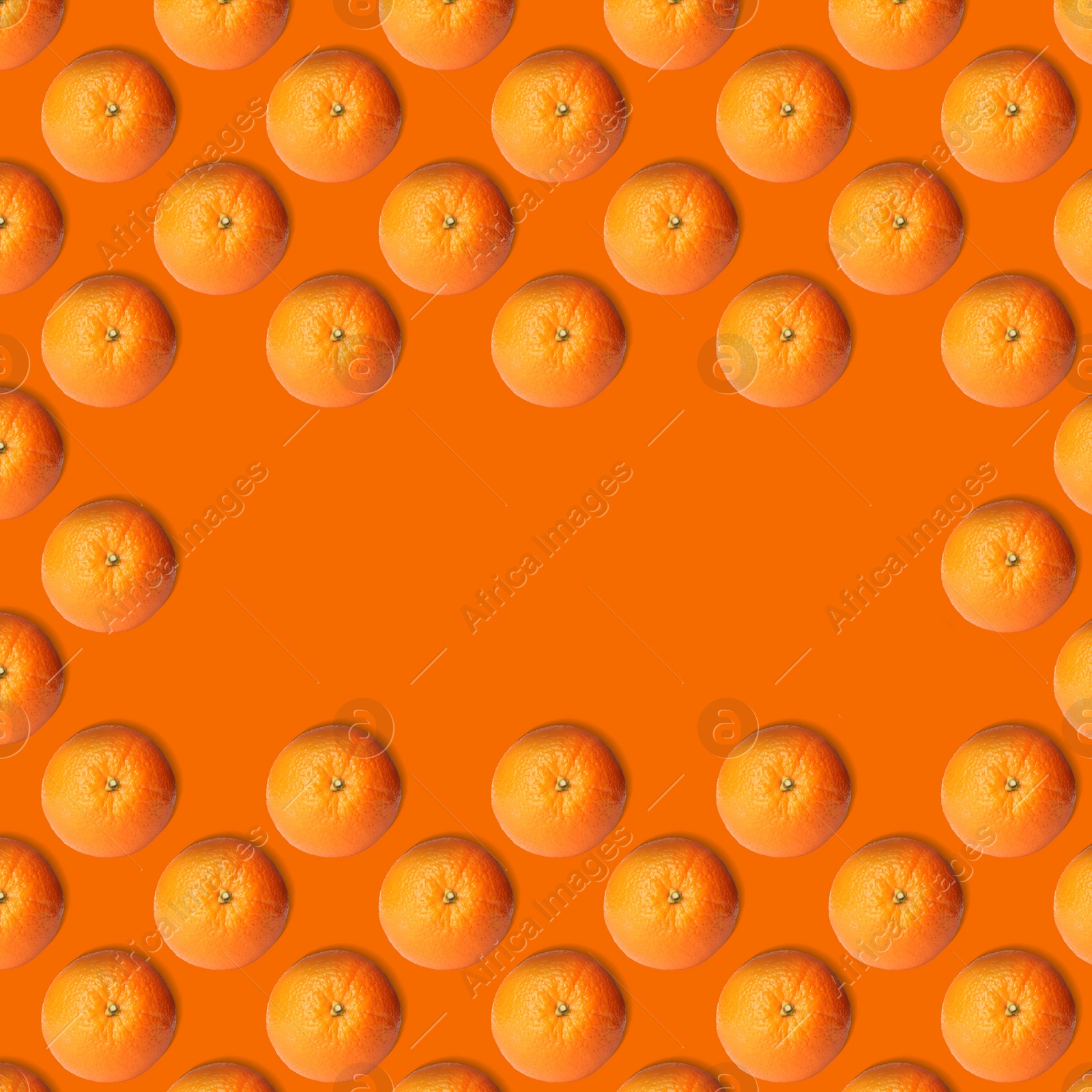 Image of Frame of tasty fresh ripe oranges on orange background, top view. Space for text